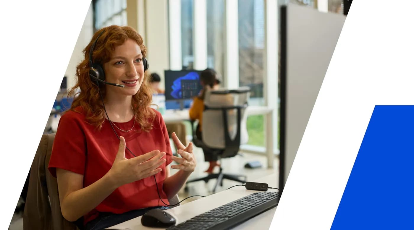 Woman at work wearing an HP Poly wired headset