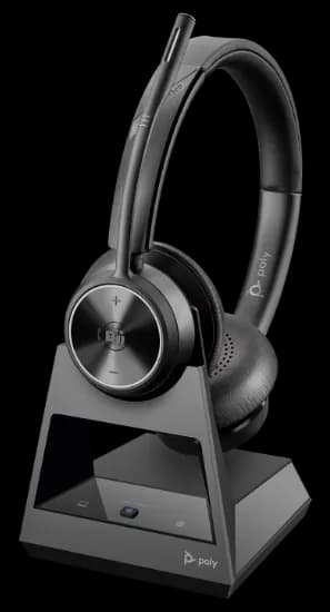 Poly Savi 7310 DECT wireless headset connected to charge stand