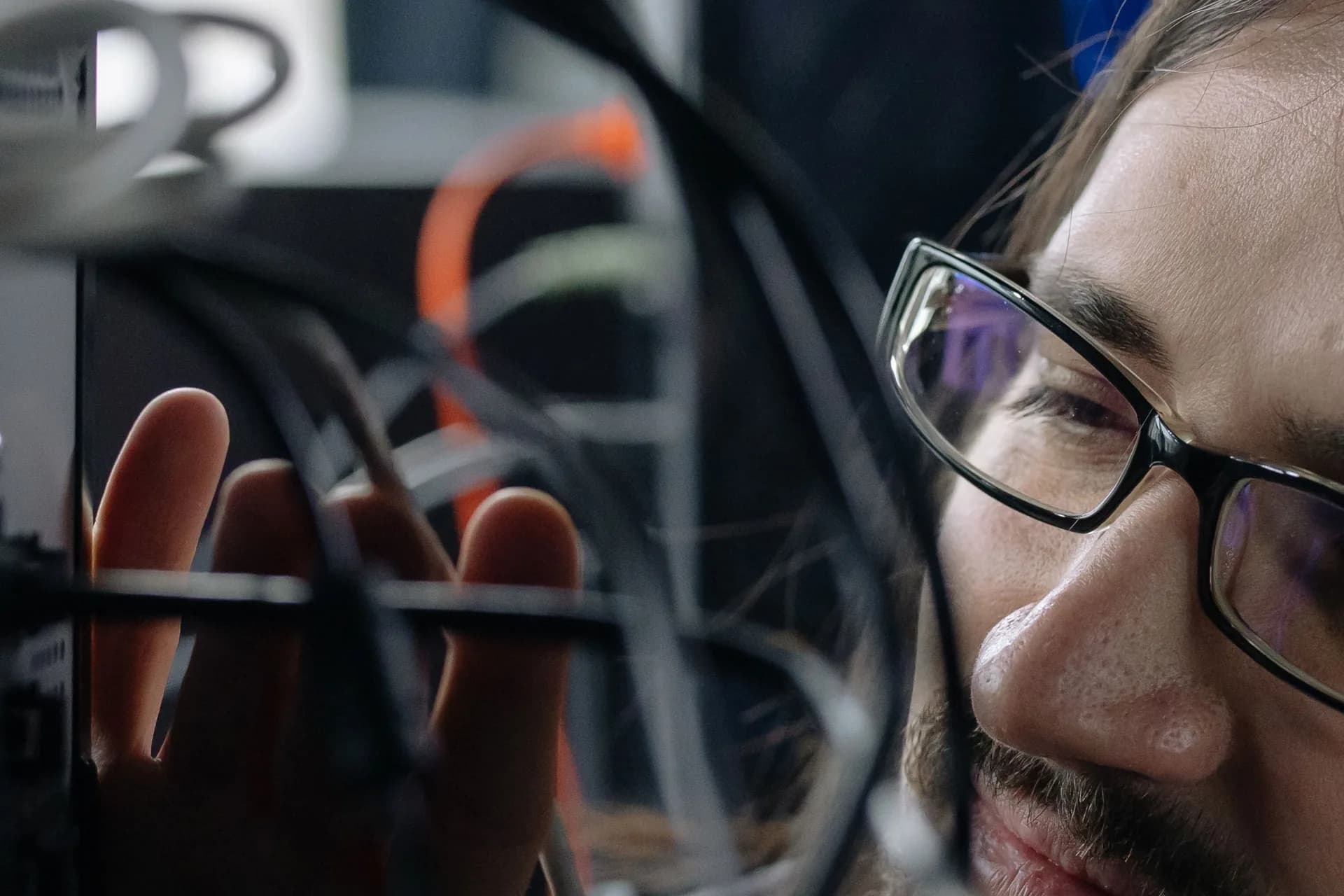 IT technician working on network cabling